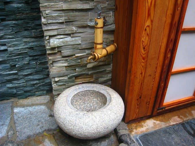 small japanese water bowl with faucet