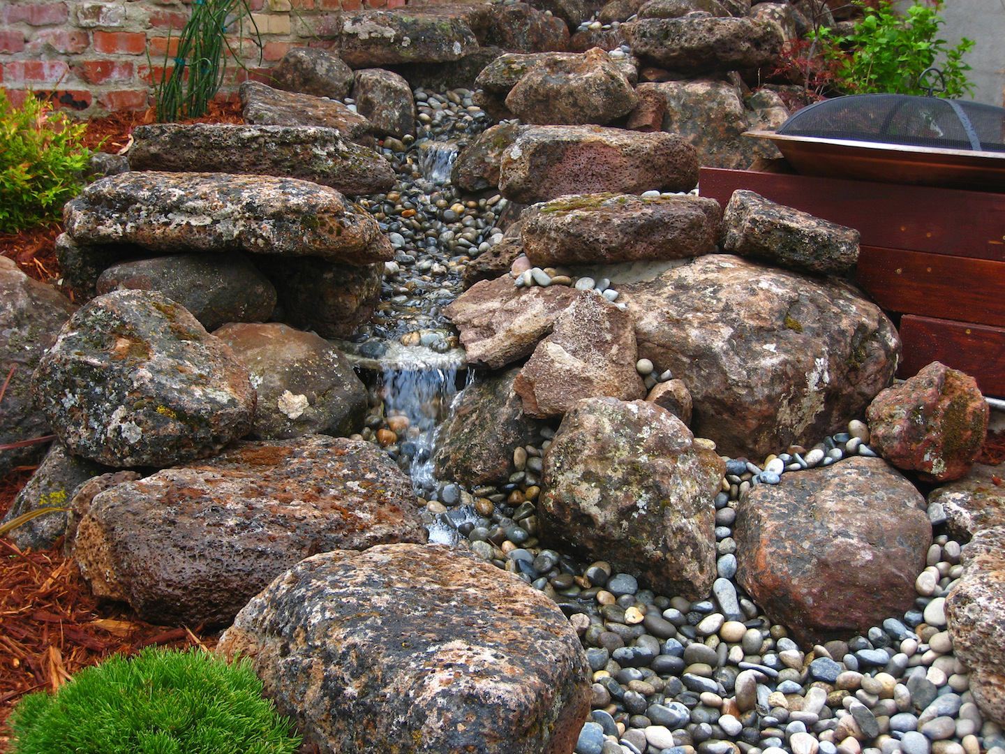 boulders and stones with a stream running through