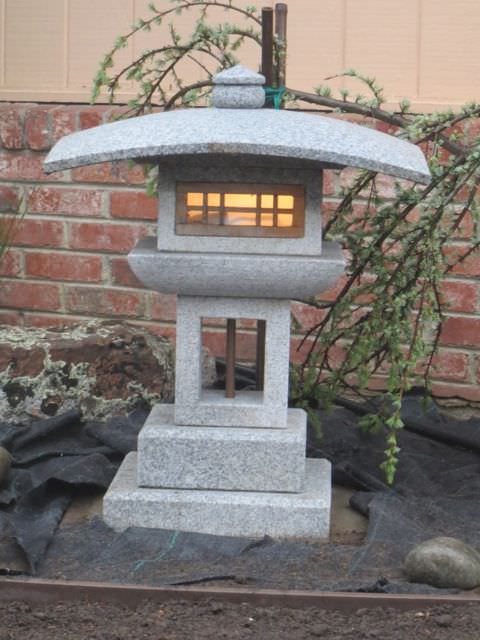 low stone Japanese style outdoor lighting
