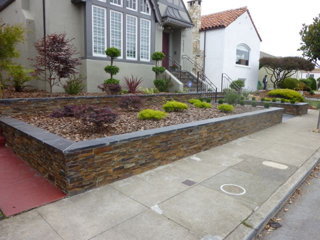 Stone faced CMU retaining wall 