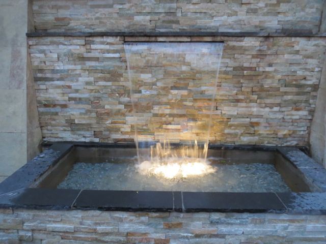 custom waterfall lit by spotlights