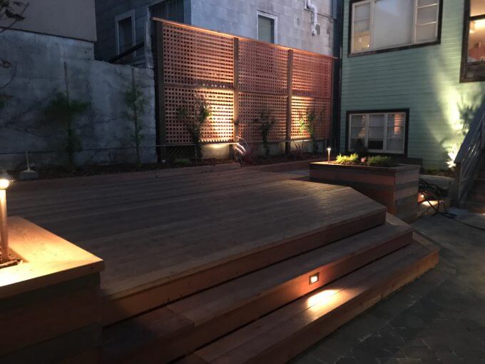 Backyard Landscape Project: New redwood deck with large planter boxes, step lights, path lights and uprights
