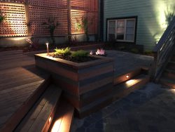 Backyard Landscape Project: Redwood lattice, decorative plants and backlighting