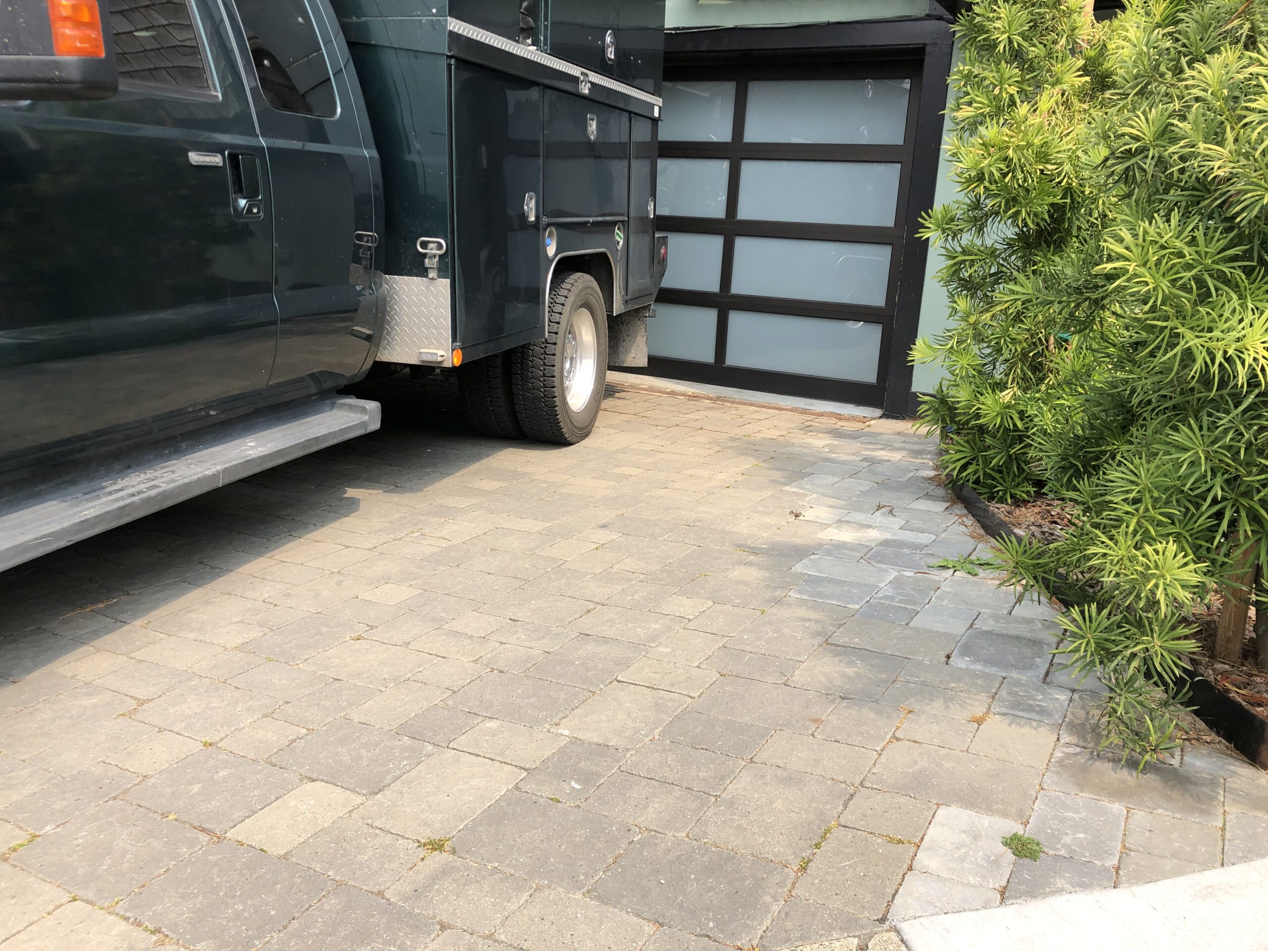Interlocking concrete pavers in driveway