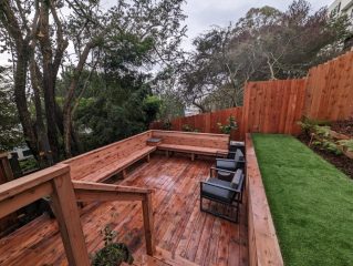 Ashbury Heights completed bottom deck with custom bench sitting area and redwood privacy fencing