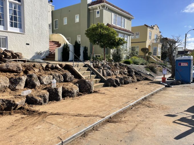 Building of boulder wall in-process