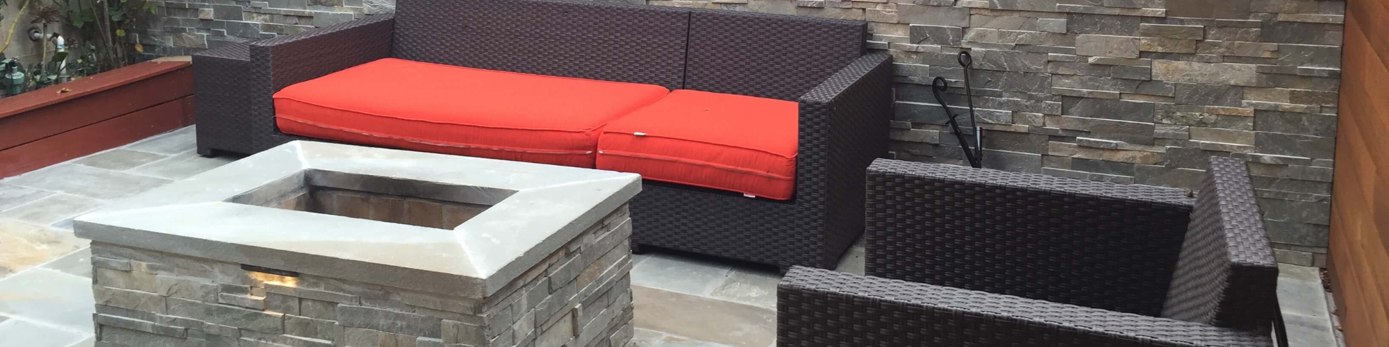 Masonry contractor services - decorative retaining walls and bespoke stone firepit