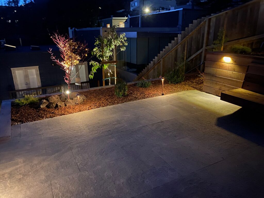 New patio leads to stairs and a lower deck in San Francisco