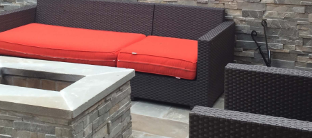 Masonry contractor services - decorative retaining walls and bespoke stone firepit